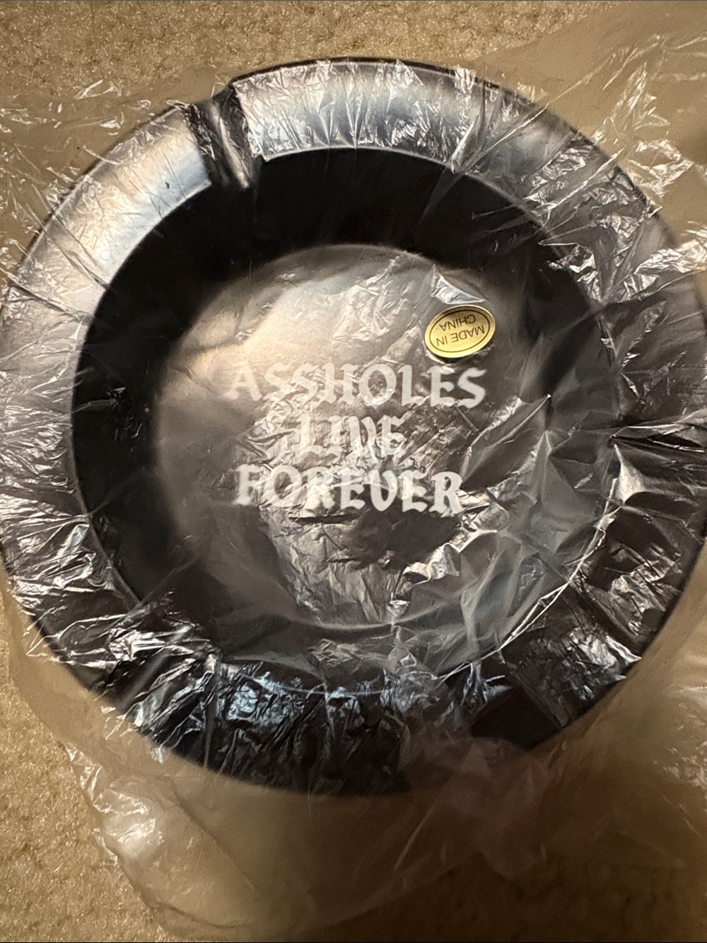 Black Plastic Ashtray with White Text - Novelty Home Accessory